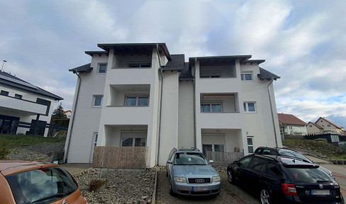 Living space on two levels: Bright 4.5-room maisonette apartment, 109 m², with a balcony, expansive views, and a parking space in Osterburken.