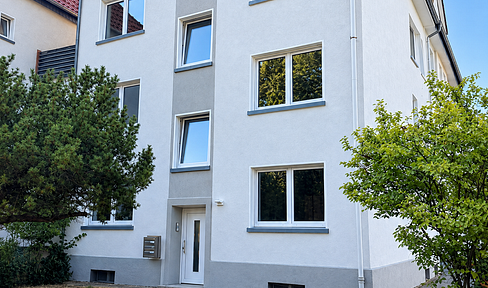 Renovated 3-room apartment with balcony - new windows, electrical system, heating, and fire safety features!