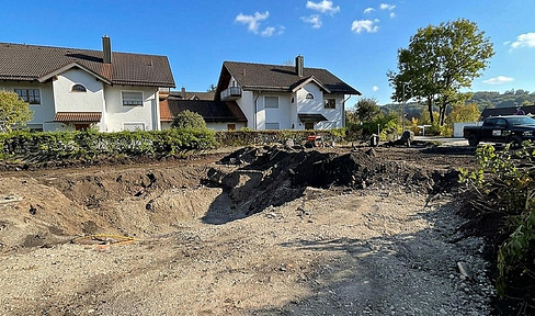 Construction has begun! Modern corner house in a quiet location in Wolfratshausen.