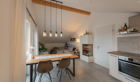 Modern, practically new 2-room apartment in the attic, with a large south-facing balcony.