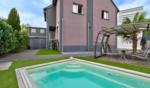 Vielseitiges Wohninvestment mit Pool, Ausbaureserve und attraktiven Mieteinnahmen