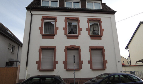 MA-Käfertal - Ground-floor apartment with 3 rooms, a balcony, a garage, and a small garden.