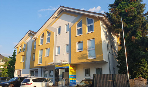 Bestehendes Apartmenthaus mit Baugenehmigung für ein 6-Familienhaus an der Bergstraße