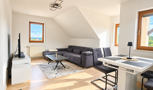 Helle 3-Zimmer-Dachgeschosswohnung mit Balkon, Einbauküche und Garage in Krautheim