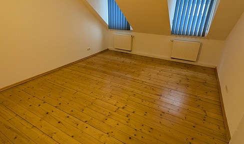 2-room attic apartment with fitted kitchen, located in a central area of Wiesbaden.