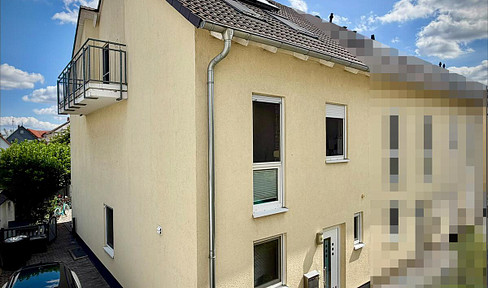 Well-maintained terraced house with a garden and 2 bathrooms – available without commission in Trebur-Geinsheim.