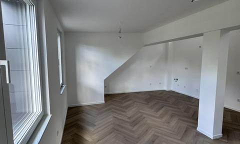 Exklusive 2,5-Zimmer-DG-Neubauwohnung (5 % AfA) in Dortmund – Wärmepumpe & Erstbezug