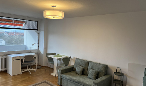 Fully furnished 1-bedroom apartment with a large south-facing balcony and access to a swimming pool – excellent location in Munich-Laim.