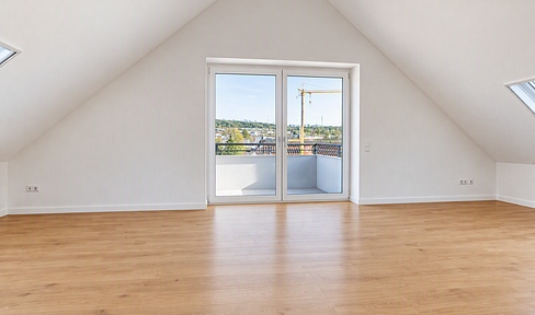 First occupancy after renovation: Modern 2.5-room attic apartment with a southeast-facing balcony and a new kitchen.