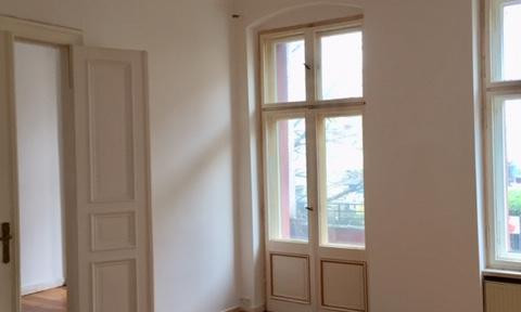 2-room apartment in a historic building, available immediately.