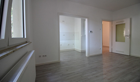 Bright 2-room apartment with an open-plan kitchen - located in the city center, with a south-facing aspect.