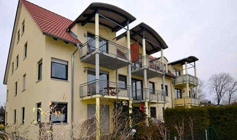 Stylish and well-maintained 2-room apartment with a balcony and fitted kitchen in Mering.
