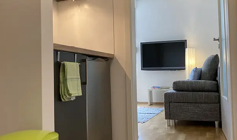 One-bedroom, non-smoking apartment with parquet flooring, including a parking space in Beuel, available from November 1st, 2026.