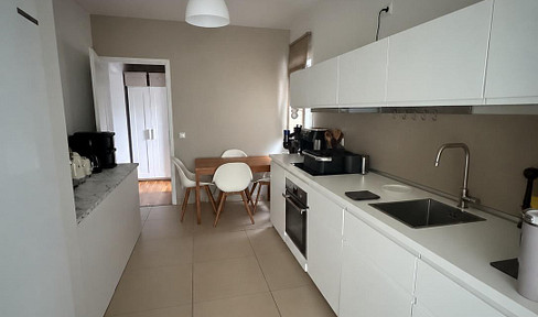 Moderne 2- Zimmer Wohnung mit Terasse, kleinem Garten und EBK