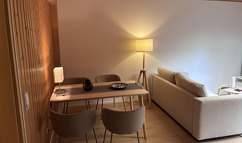 Fully furnished 2-room apartment with a south-facing terrace and parking space – all-inclusive.