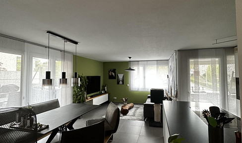Brand new 4-room apartment with a designer kitchen, sun terrace, and 2 underground parking spaces.