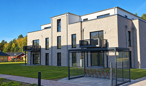 Erstbezug: Moderne Wohnung im Staffelgeschoss und Dachterrasse sowie energieeffizientem Wohnkomfort