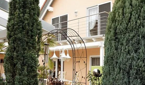 Dream home in Mediterranean style with a summer kitchen - move in and feel right at home.
