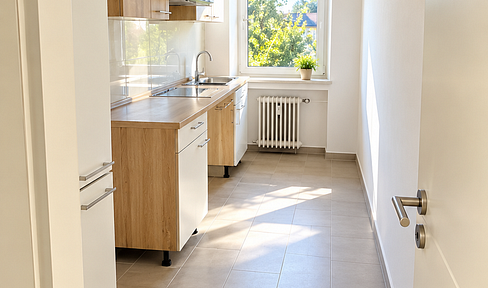 2.5-room apartment with a kitchen and balcony.
