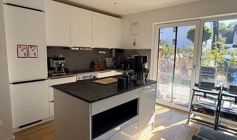 Sun Garden in Langenbach: New construction, 3-room ground floor apartment with a large private garden and kitchen.