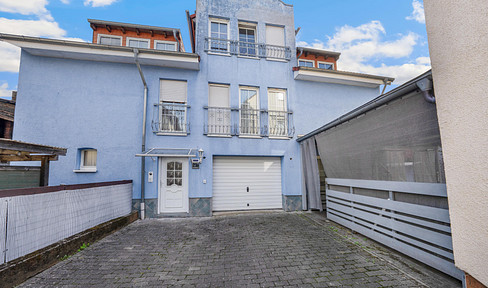 Living and working on a 287 square meter property in Aßlar-Berghausen.