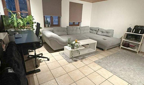 Beautiful, bright 2-room apartment with fitted kitchen and parking space in Friedrichshafen.