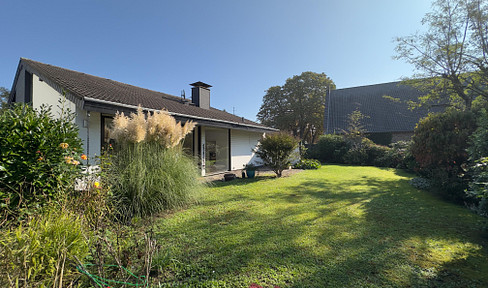 Großzügige Erdgeschosswohnung mit Souterrain, schönem Garten und Doppelgarage in Wesseling-Keldenich