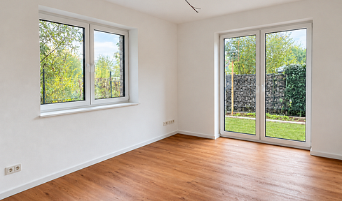 Moderne 3-Zimmer-Neubauwohnung mit zwei eigenen Gartenbereichen, Terrasse und Stellplatz