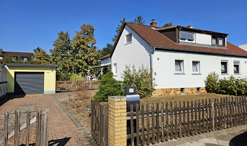 Family-friendly detached house with a large garden, located in the Gartenstadt district of Mannheim.