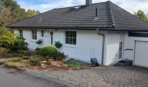 Well-maintained bungalow with a view of the greenery.