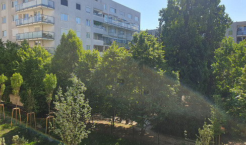 Grüne Oase 500m vom Zentrum – Innenhof mit großem Balkon, Fitness und Co-Working – Erstbezug & Warm