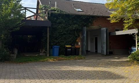 Wohn- und Gewerbeimmobilie mit großzügiger Dachgeschosswohnung