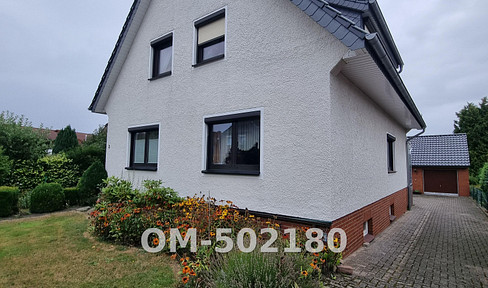 Charming two-family house with a large garden and plenty of potential.