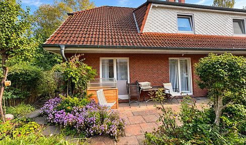 Gepflegtes Wohnidyll in Krupunder: Ruhige Doppelhaushälfte mit Blick ins Grüne & Top-Anbindung