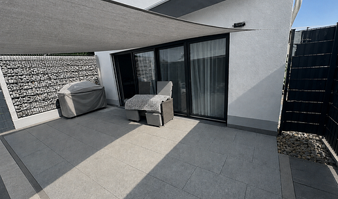 Attraktive Erdgeschosswohnung mit Terrasse & großem Garten