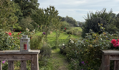 Apartment by the Schaalsee lake with a garden and lake views.