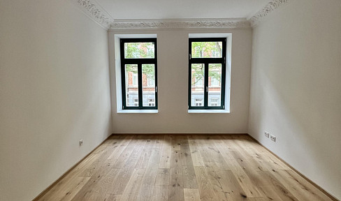 First occupancy after high-quality renovation, with balcony and parking space.
