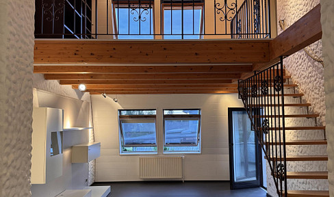 Stylish maisonette apartment with a balcony and parking space in Nidderau-Heldenbergen.