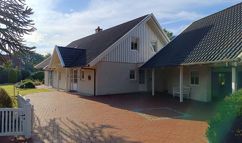 Dream home with sauna and a spacious garden plot in Aurich-Wiesens – No commission fees.
