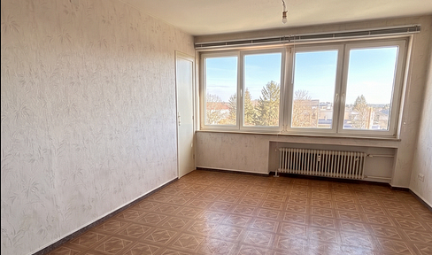 Sehr zentral gelegene lichtdurchflutete 3 Zimmer Wohnung zzgl. einer Garage zu verkaufen!