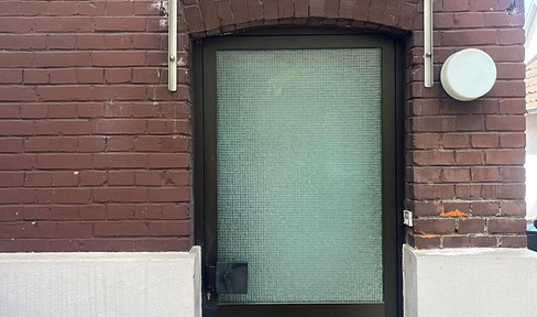 Zweifamilienhaus mit Garten mitten in der Stadt
