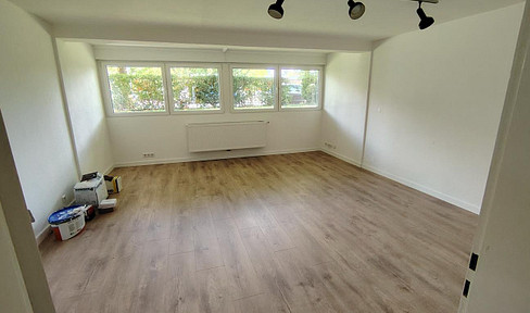 Frisch sanierte 2-Zimmer Souterrain-Wohnung direkt neben S-Bahn. Ideal für Pendler