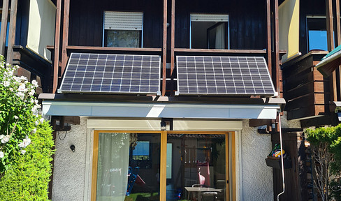 Well-maintained, modernized terraced house with a south-facing garden.