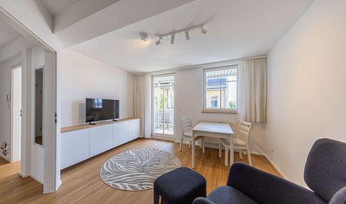 Mit privatem Balkon zum Innenhof: Möbliertes Zimmer in gepflegter 2er-WG