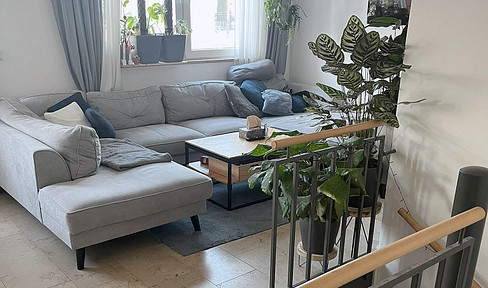 Moderne und hochwertig ausgestattete 3 ZKB Maisonette - Terrassenwohnung mit sonnigem Garten