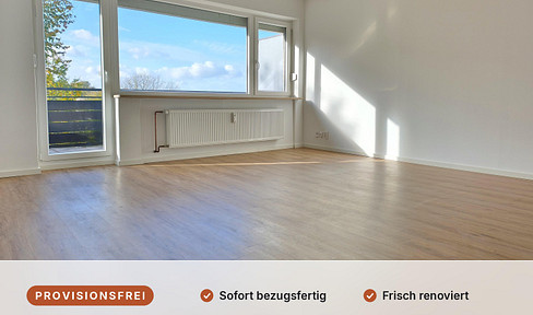 Commission-free and ready to move in: renovated 3-room apartment with fitted kitchen and parking space.