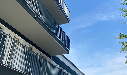 NEUBAU im Erstbezug: 2,5 Zimmer Wohnung mit EBK, Dachterrasse und Tiefgarage