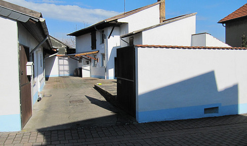 FOR SALE: Detached house with outbuilding, garden, garage, courtyard, and cellar.