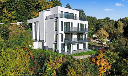 New construction: A stunning 3.5-room apartment with panoramic views, including a parking space.