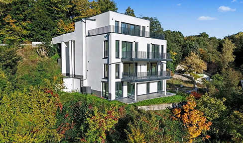 New construction: A stunning 3.5-room apartment with panoramic views, including a parking space.